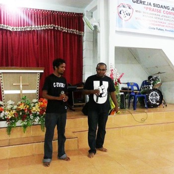 Jeshurun and Sangli Dass of CFOURJ sharing testimony in a Church in Medan, Indonesia with Kajang AOG Mission Team
